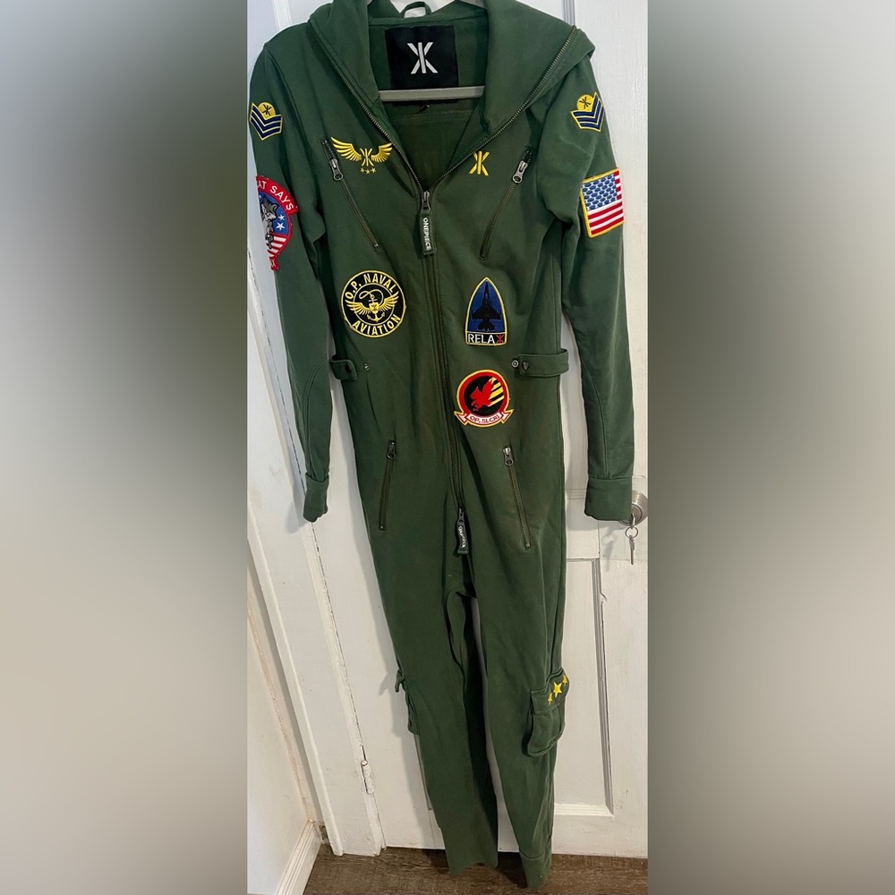 Like new onepiece aviator army green onesie XXS runs larger in sizing